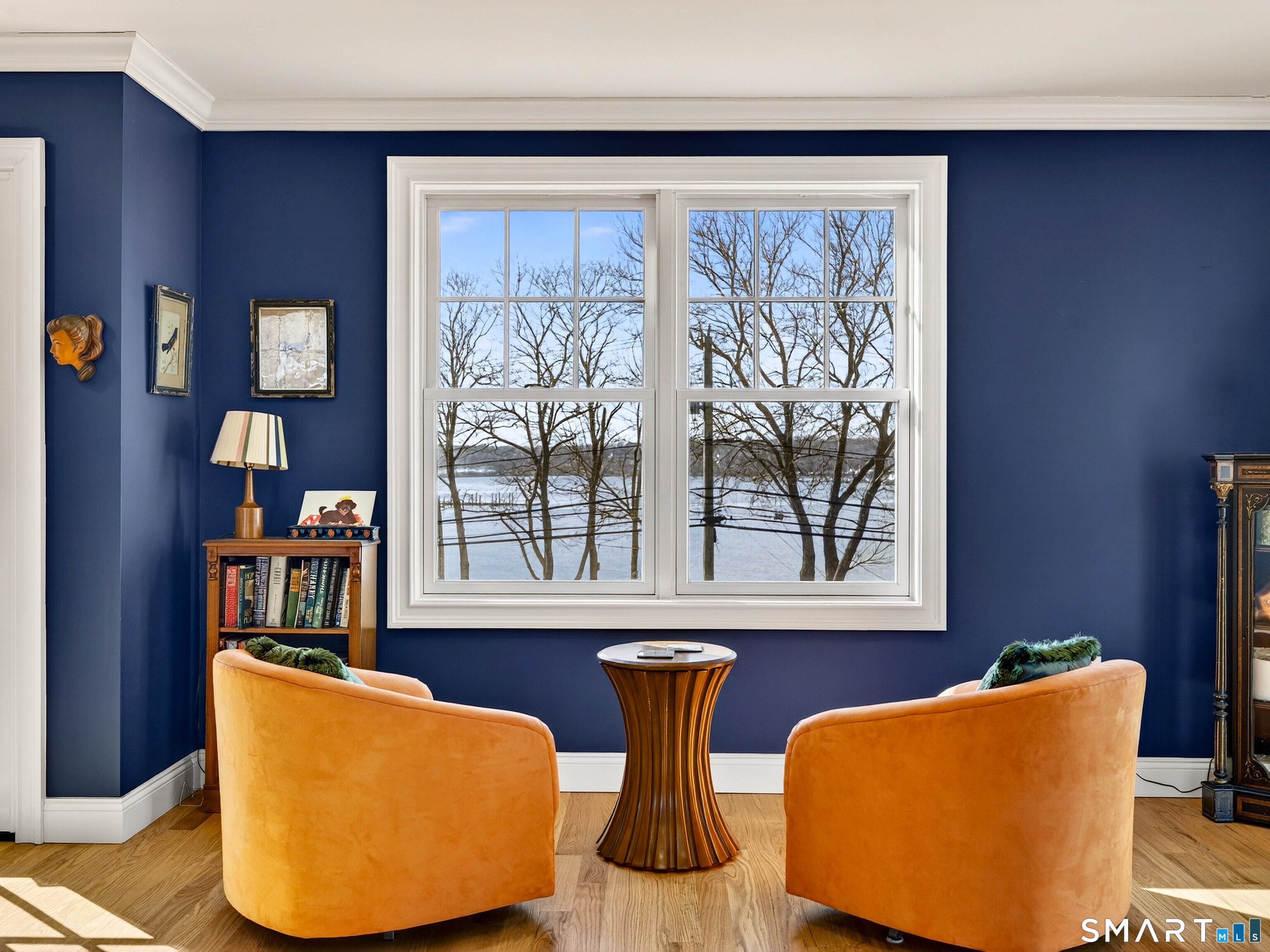 77 Masons Island Road Stonington, CT 06355 - Photo 23 of 35 a living room with furniture and window