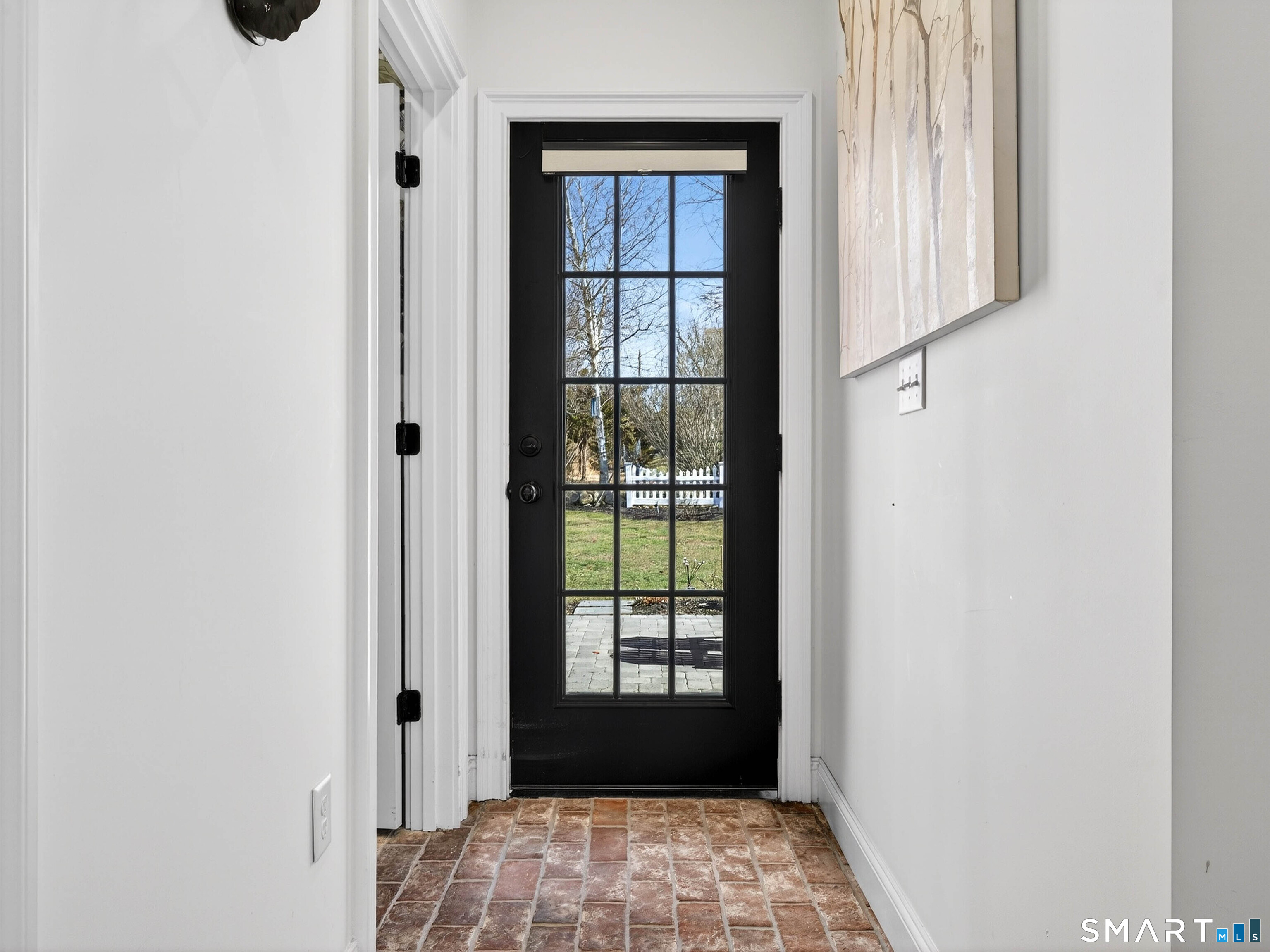 77 Masons Island Road Stonington, CT 06355 - Photo 4 of 35 a view of empty room with windows