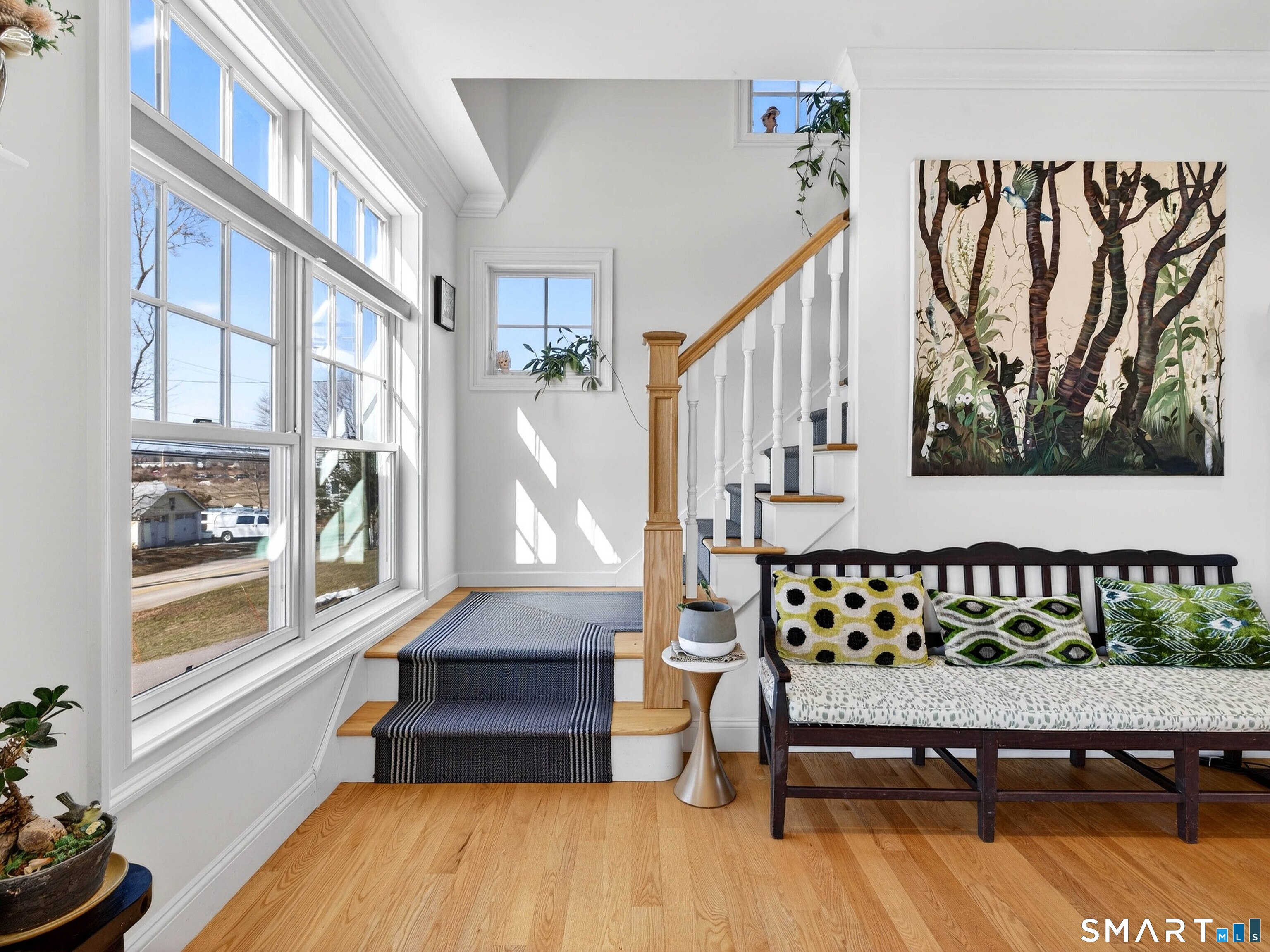 77 Masons Island Road Stonington, CT 06355 - Photo 9 of 35 a view of entryway with wooden floor and stairs