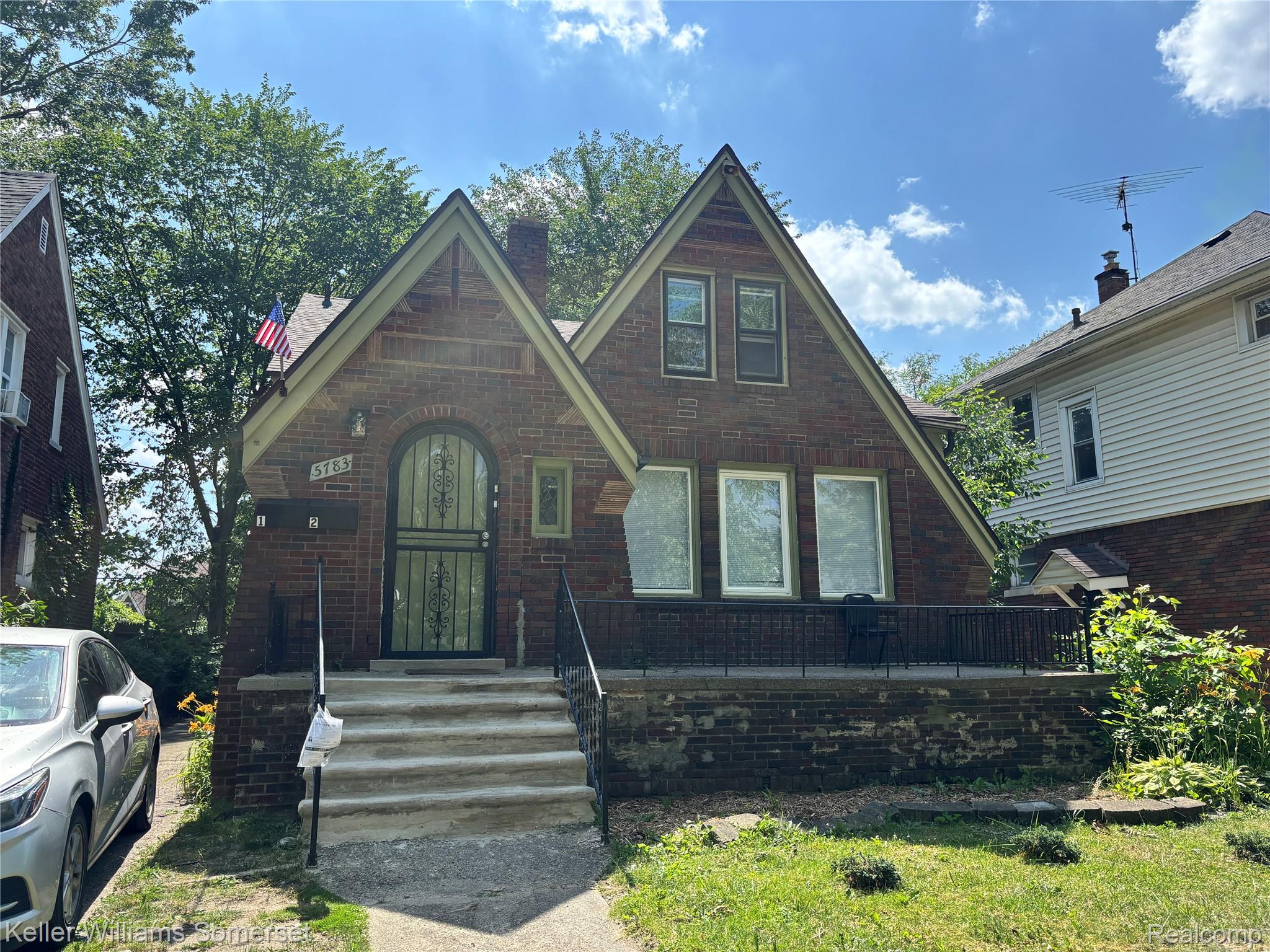 5783 Yorkshire Road Detroit, MI 48224 - Photo 13 of 13 Brick construction residence featuring a prominent gabled roofline