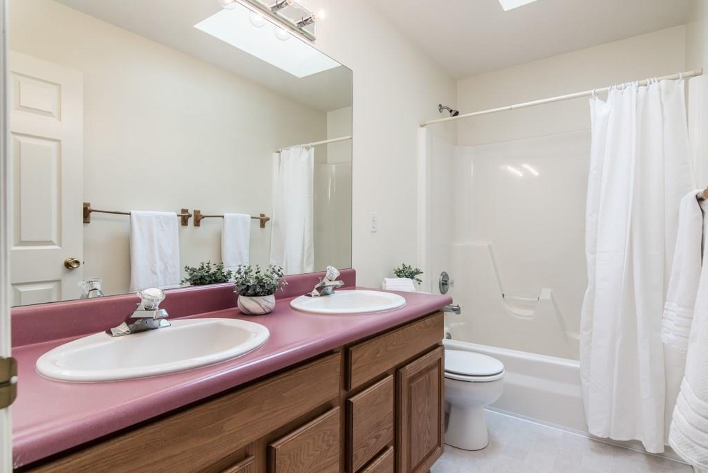225 Logan Road Valencia, PA 16059 - Photo 19 of 25 This 2nd-floor full bath easily serves the 3 bedrooms. The skylight offers the beauty of natural light.
