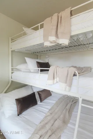 a kitchen with a sink a stove and a microwave