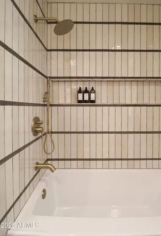 a room with granite countertop furniture and a large window