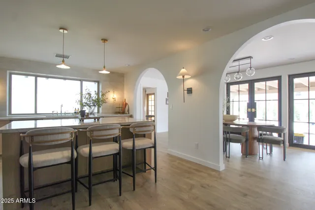 a bedroom with a bed and a night stand