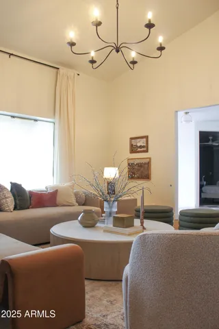 a bathroom with a shower and a glass door