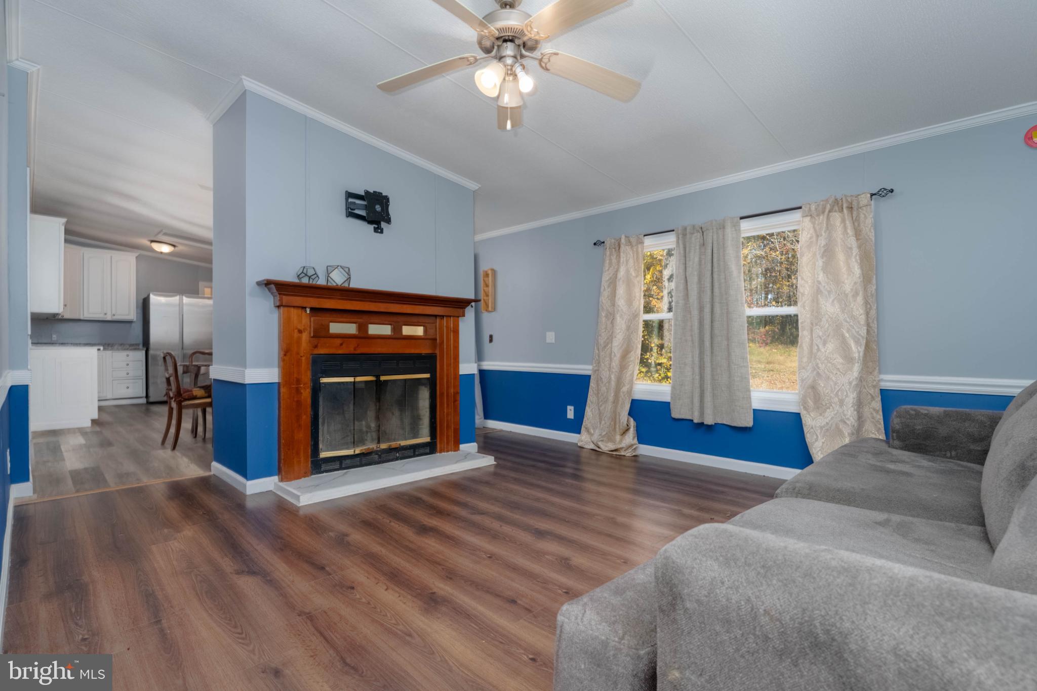 1900 Fletcher Road Aberdeen, MD 21001 - Photo 14 of 41 Cozy living space with charming fireplace.
