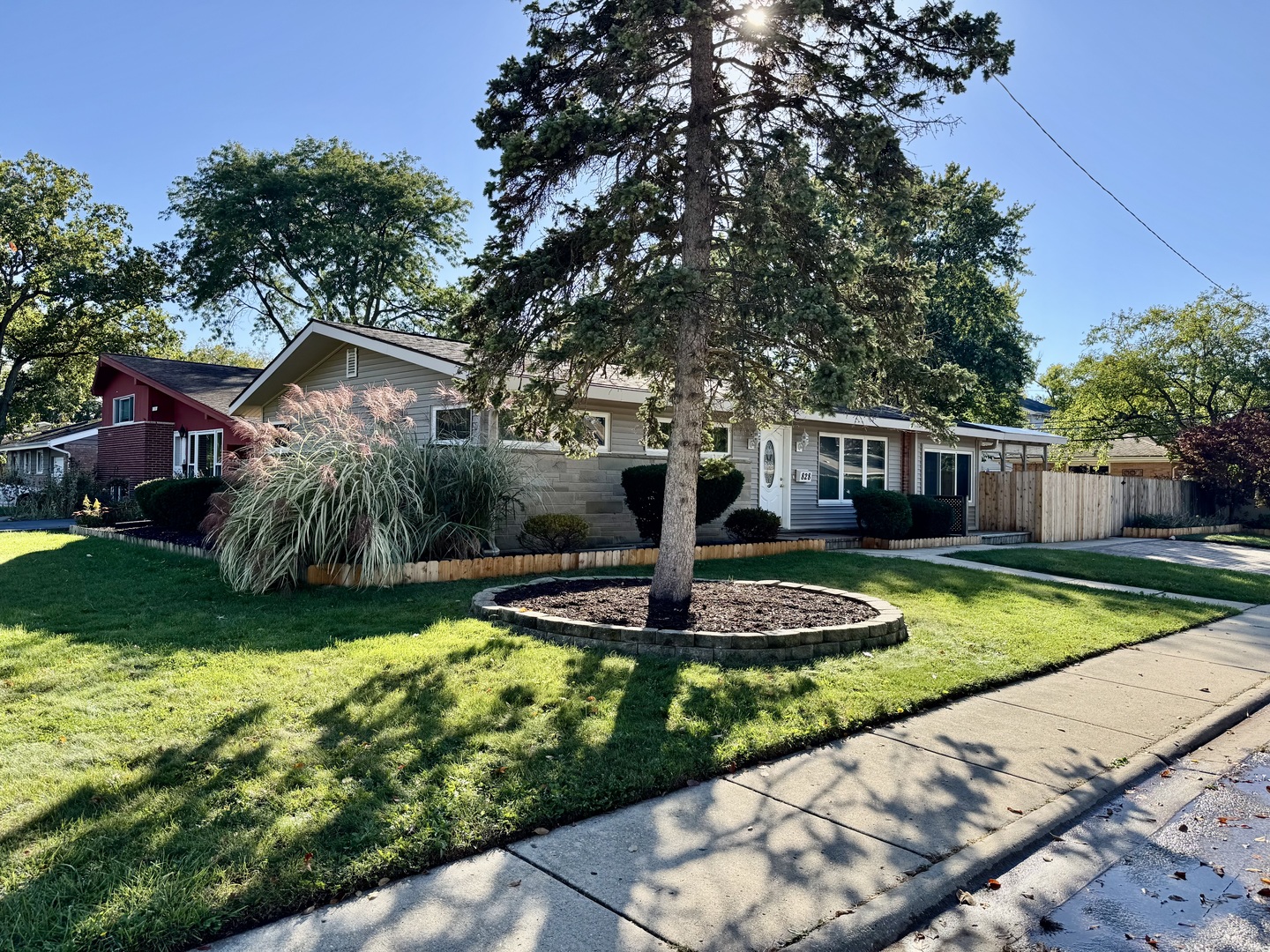828 Dell Road Northbrook, IL 60062 - Photo 36 of 37 a front view of a house with a yard