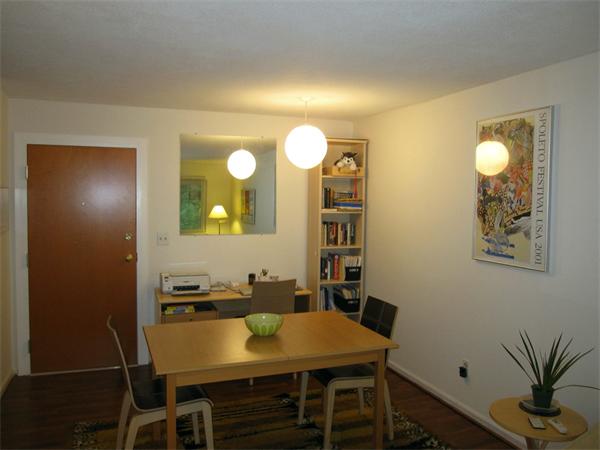 72 Barrett Street, Unit 312 Northampton, MA 01060 - Photo 3 of 7 a view of a dining room with furniture and wooden floor