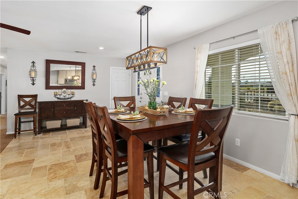 34990 County Line Road Yucaipa, CA 92399 - Photo 13 of 51 a view of a dining room with furniture