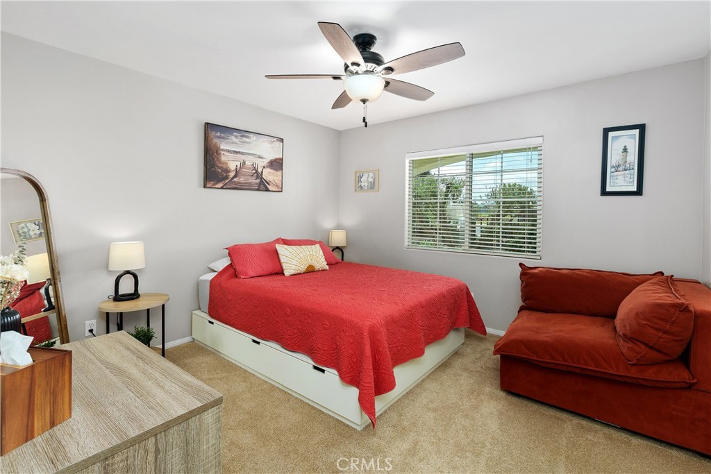 34990 County Line Road Yucaipa, CA 92399 - Photo 20 of 51 a bedroom with a bed and a couch