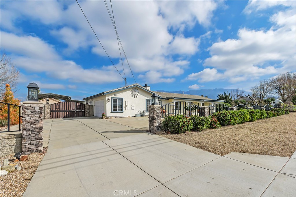 34990 County Line Road Yucaipa, CA 92399 - Photo 3 of 51 a view of house with yard and entertaining space