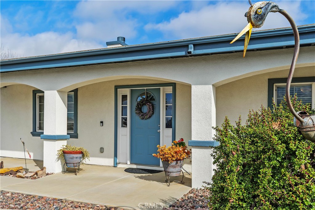 34990 County Line Road Yucaipa, CA 92399 - Photo 7 of 51 a backyard of a house with seating space