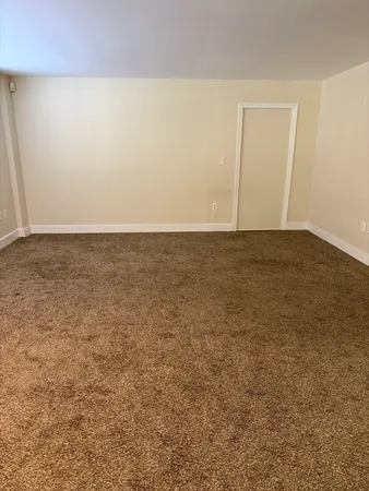 an empty room with an entryway