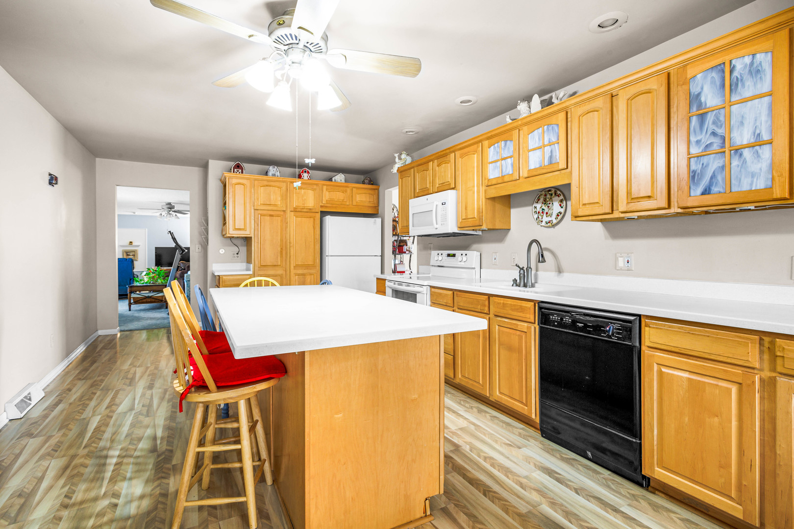 324 Rebecca Road Joliet, IL 60435 - Photo 18 of 31 a kitchen with a stove a sink and a refrigerator