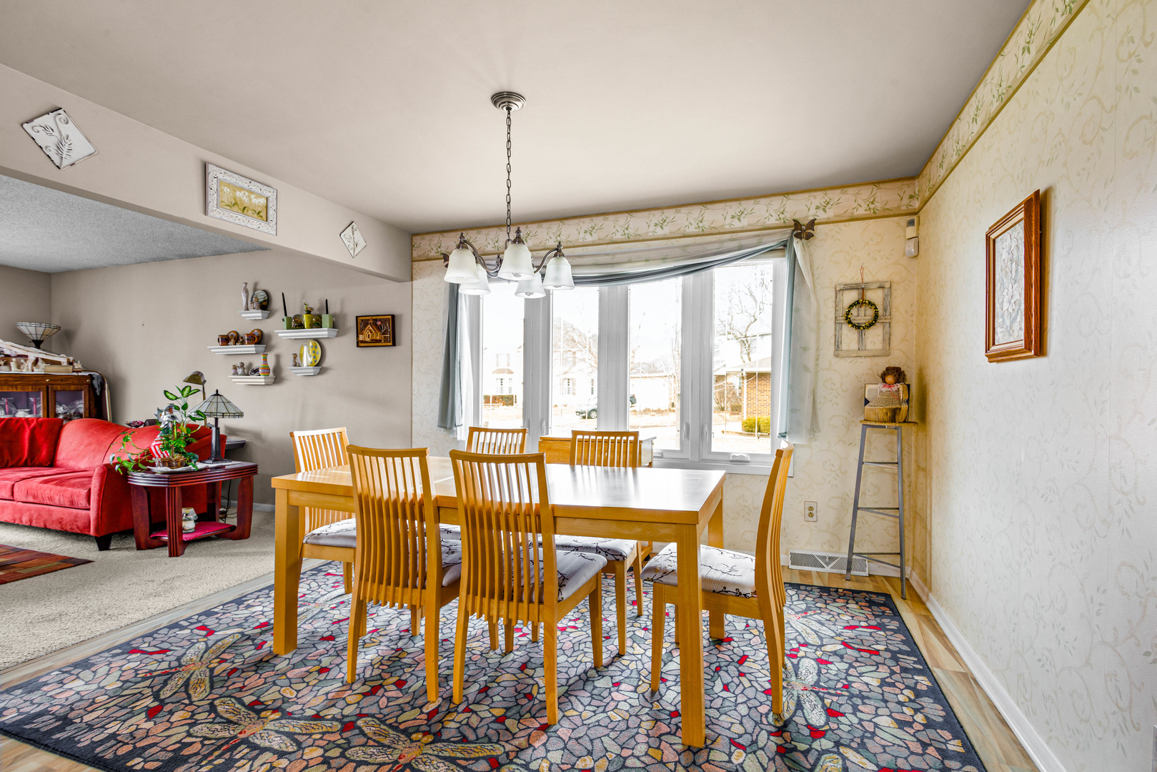 324 Rebecca Road Joliet, IL 60435 - Photo 19 of 31 a view of a dining room with furniture window and wooden floor