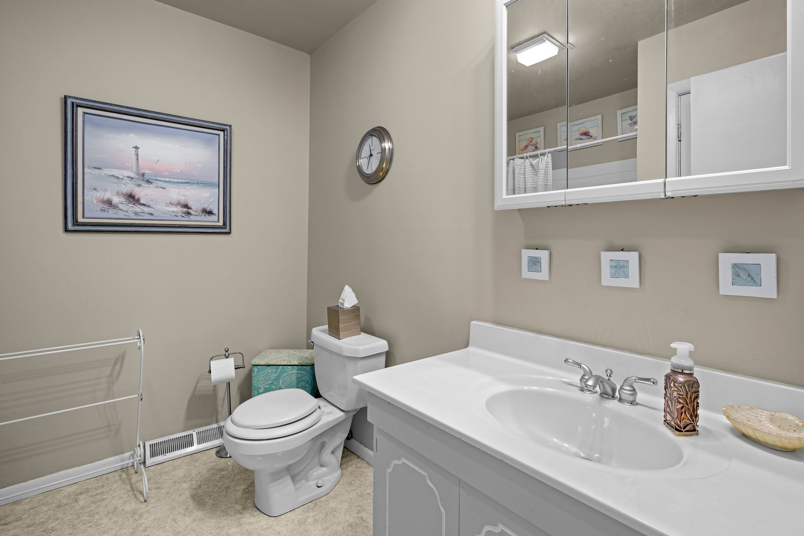 324 Rebecca Road Joliet, IL 60435 - Photo 28 of 31 a bathroom with a toilet a sink and mirror