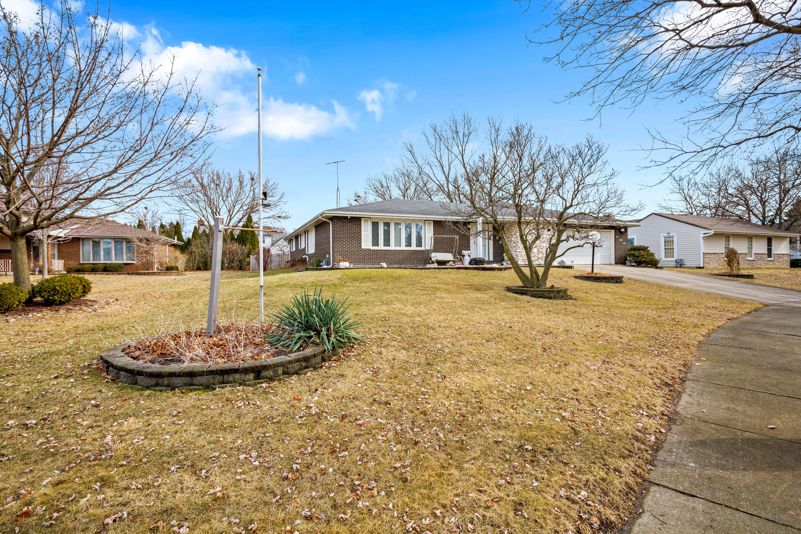 324 Rebecca Road Joliet, IL 60435 - Photo 3 of 31 a front view of a house with a yard