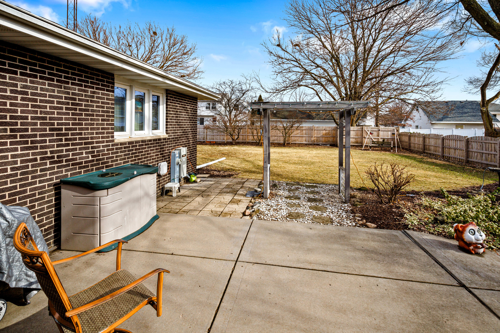 324 Rebecca Road Joliet, IL 60435 - Photo 6 of 31 a view of a backyard with chairs
