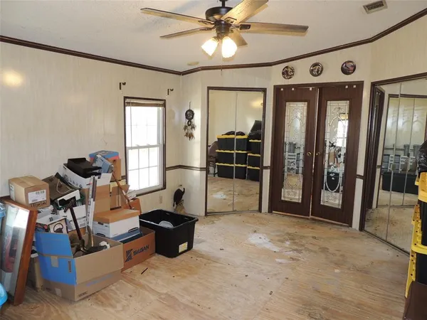 a view of a entryway door with hallway
