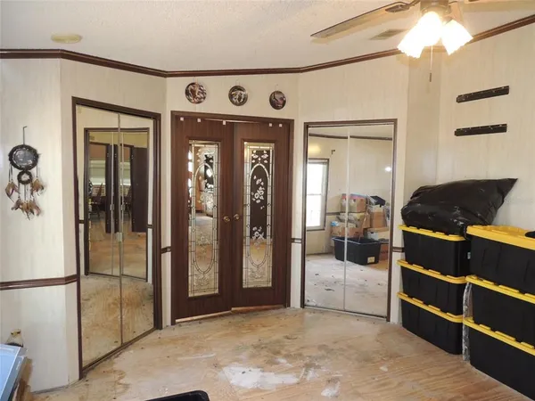 a view of a bathroom with a tub and mirror