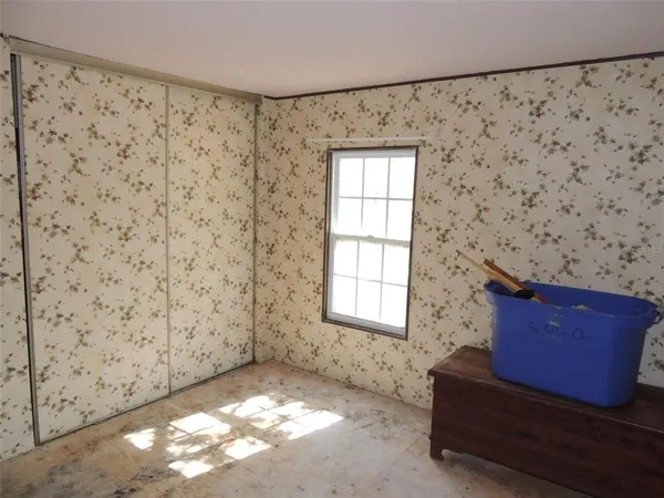 a bathroom with a shower and a sink