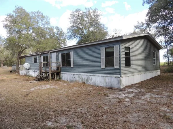 a view of a house with a patio