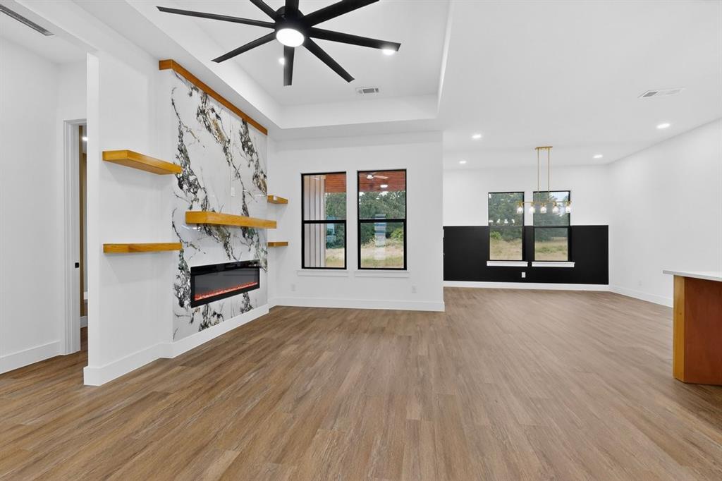 4737 Pine Ridge Court Athens, TX 75752 - Photo 7 of 26 a view of a livingroom with furniture and a kitchen