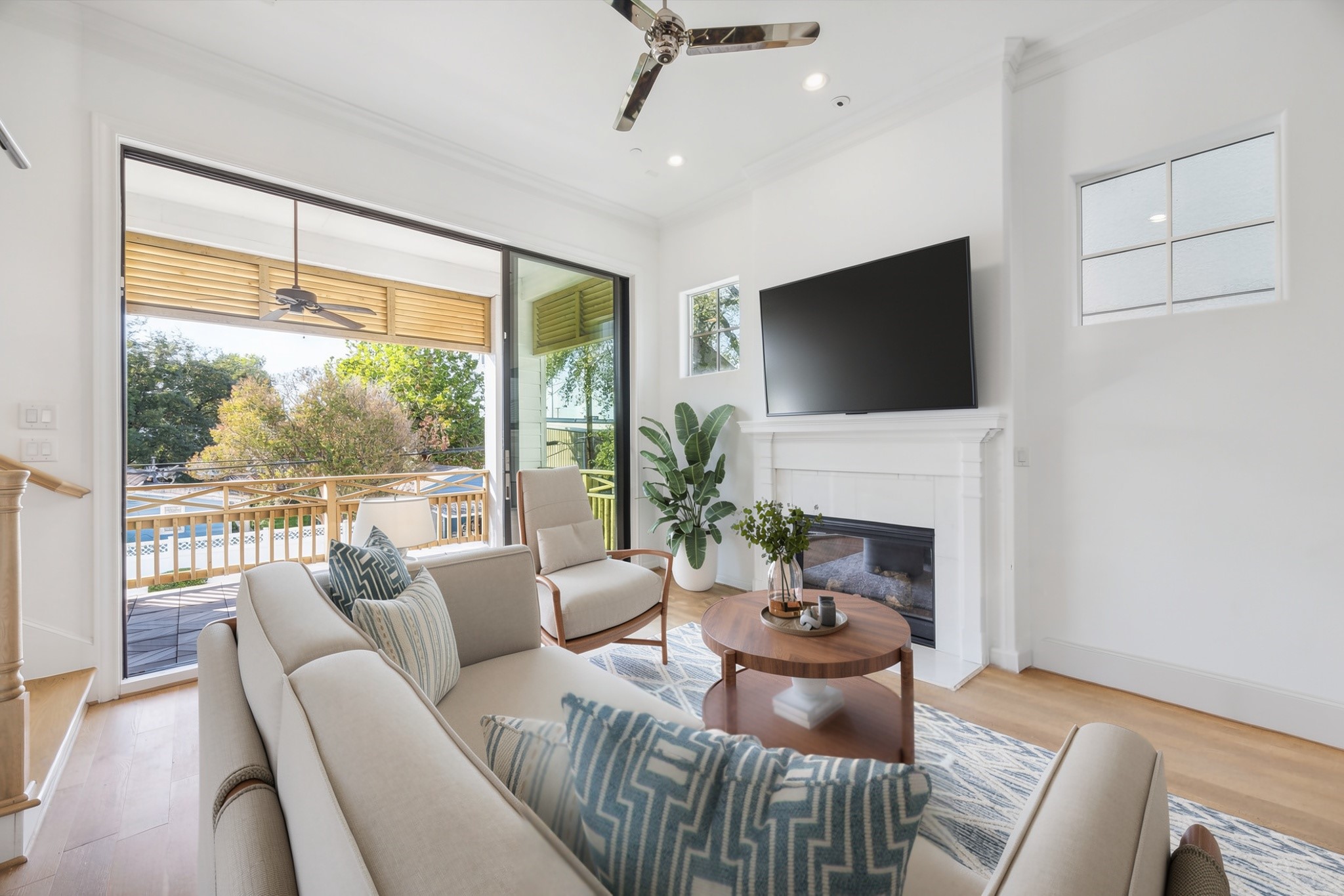 2714 Harvard Street Houston, TX 77008 - Photo 18 of 33 Stretch out and relax in front of the stately gas-log fireplace featuring a wood mantle and an Imperial white porcelain tile surround.
