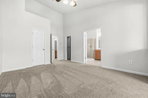 a view of empty room with windows