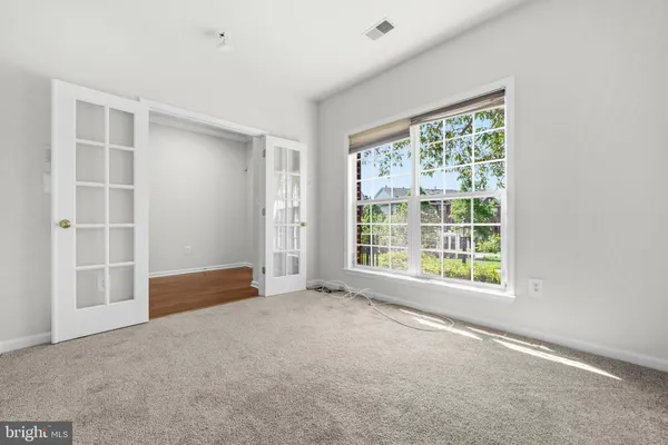 an empty room with windows