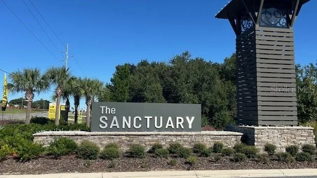 a sign that is on the side of a road