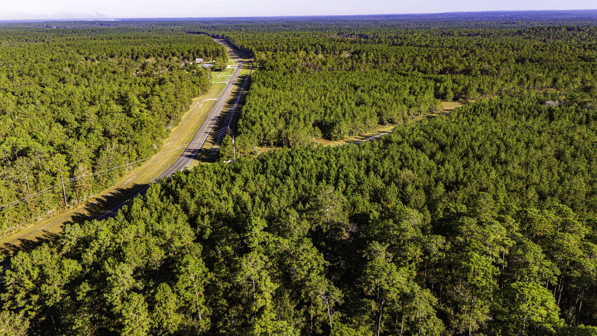 15 Magnolia Ranch Road Onalaska, TX 77360 - Photo 5 of 7 a view of a field with an outdoor space