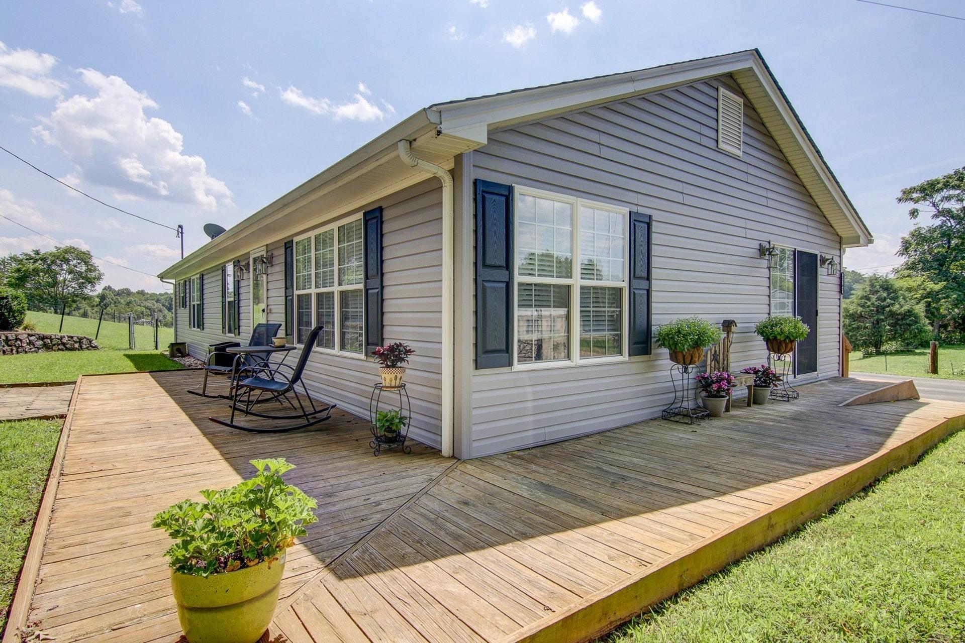 3762 Spradlin Road Goodview, VA 24095 - Photo 1 of 36 a view of a house with backyard and sitting area