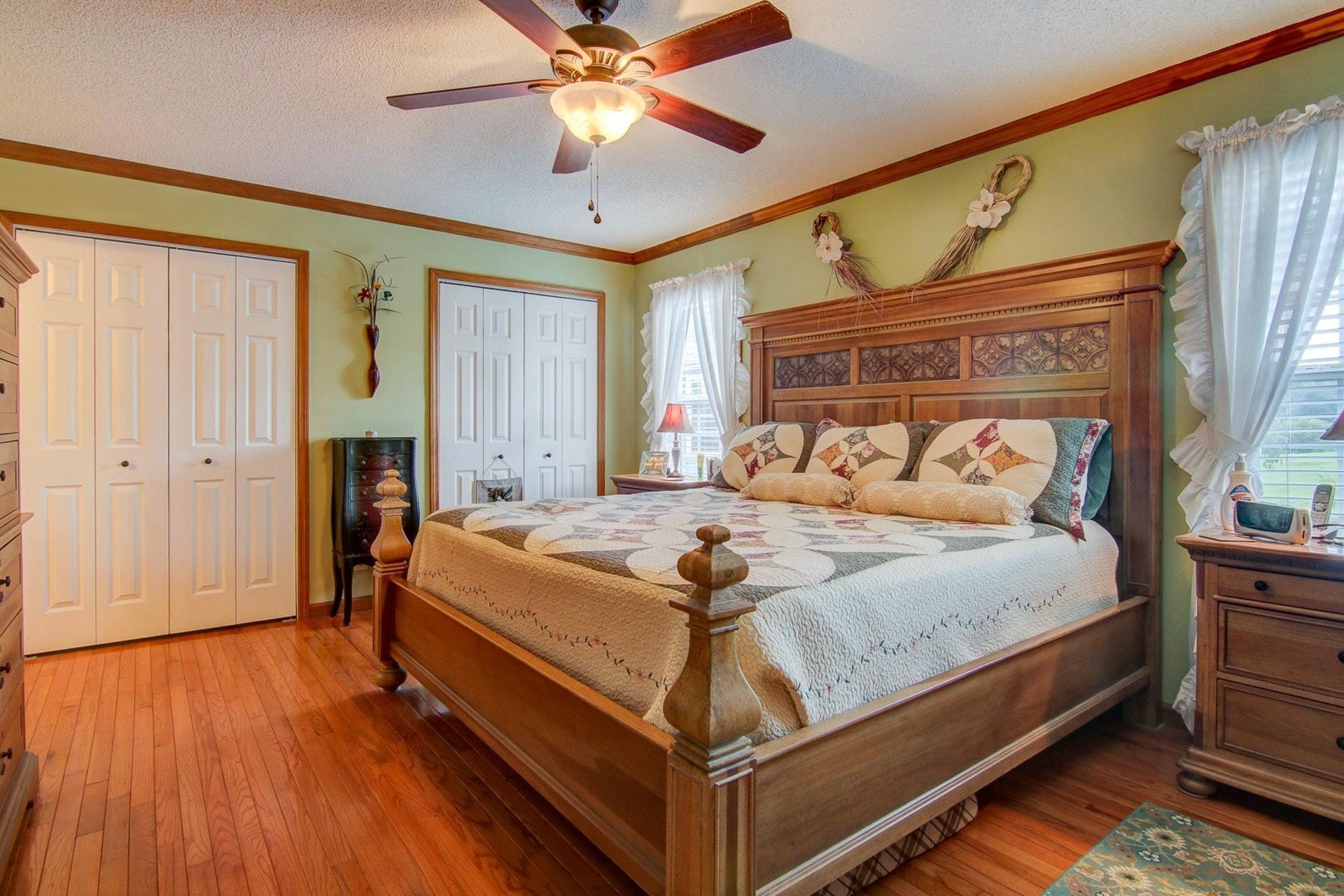 3762 Spradlin Road Goodview, VA 24095 - Photo 17 of 36 a bed sitting in a bedroom next to a window