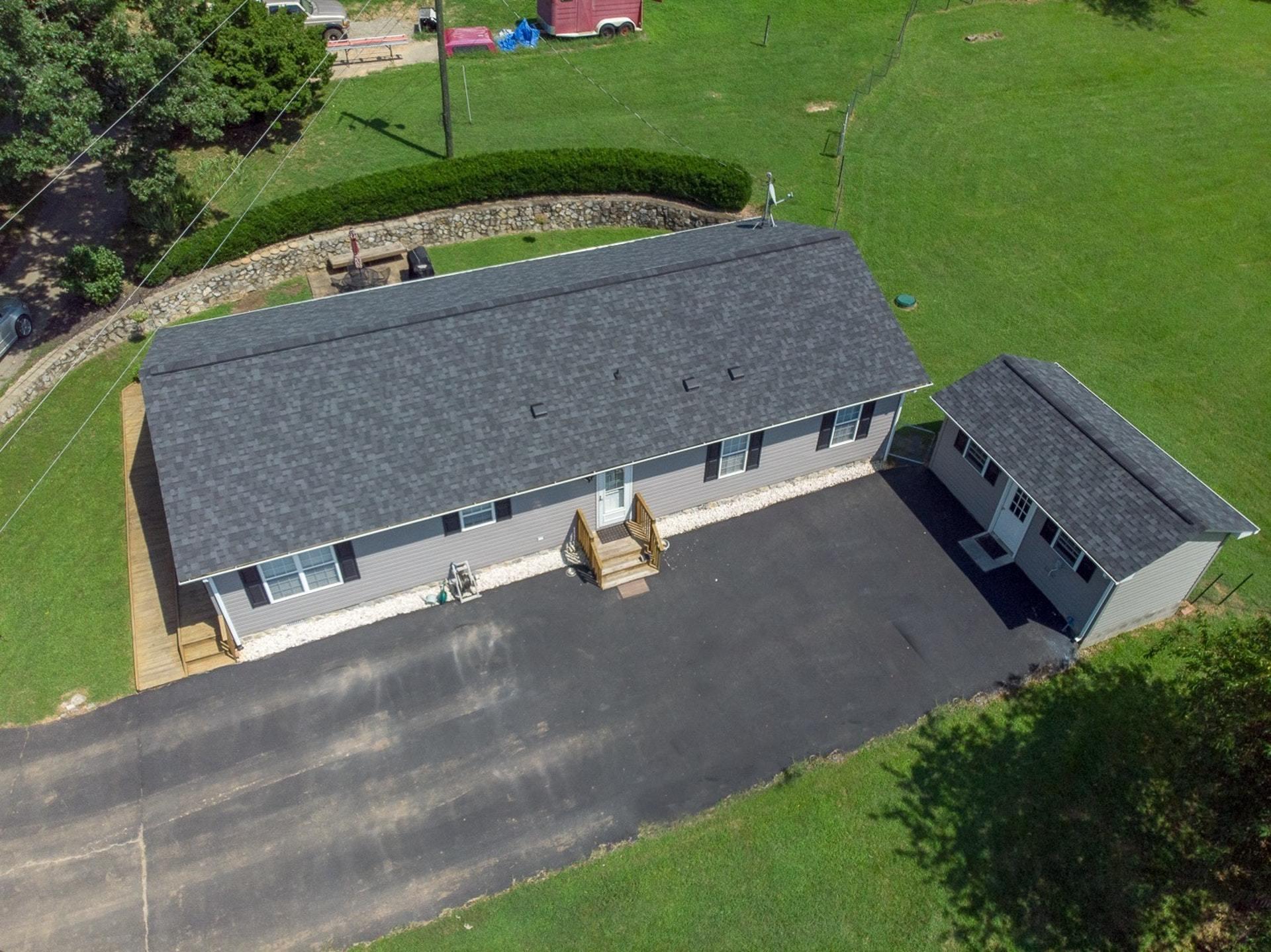 3762 Spradlin Road Goodview, VA 24095 - Photo 3 of 36 an aerial view of a house with a yard