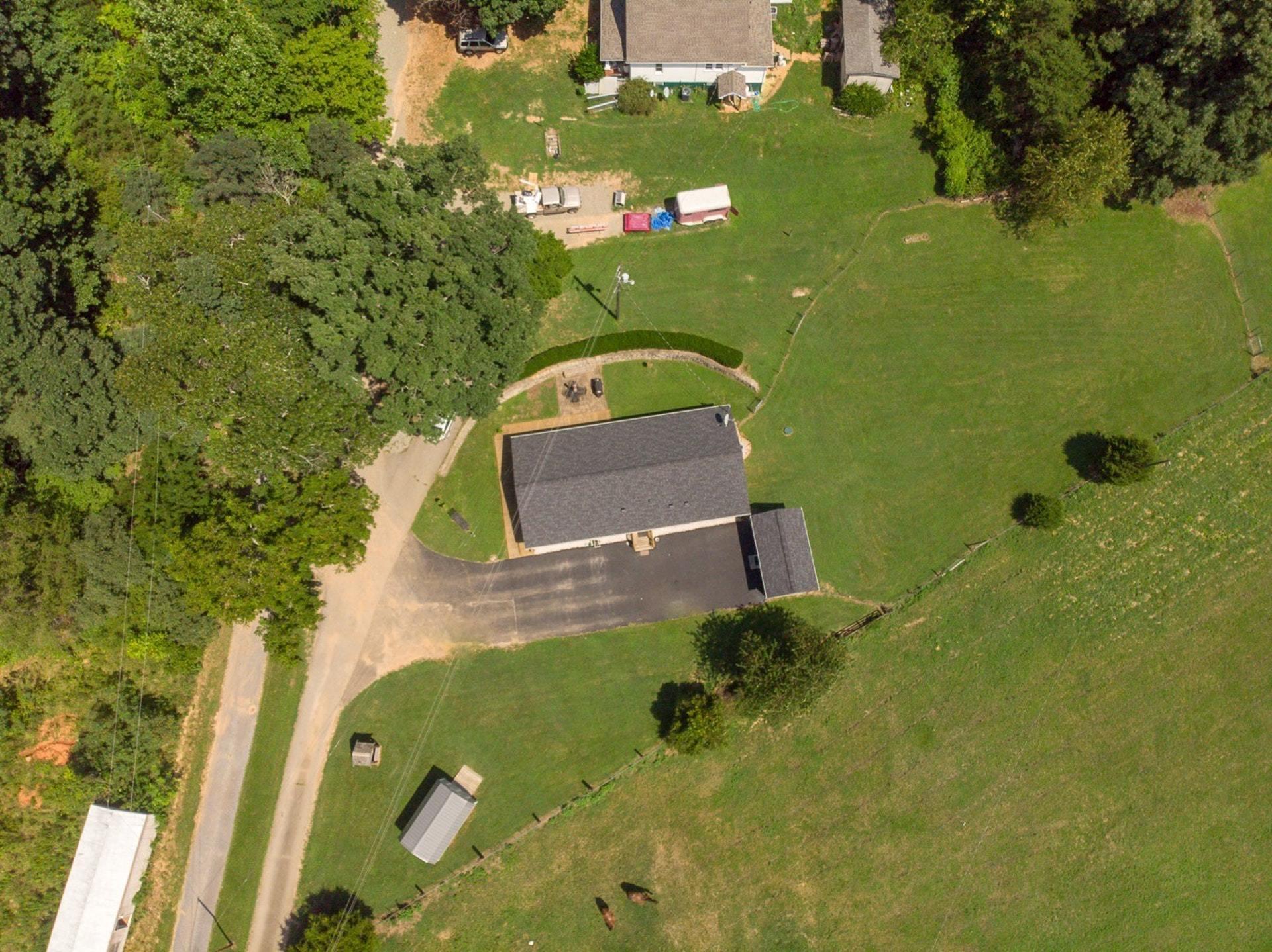 3762 Spradlin Road Goodview, VA 24095 - Photo 33 of 36 an aerial view of a house with a yard
