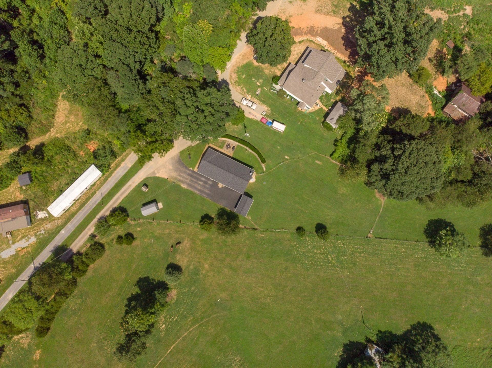 3762 Spradlin Road Goodview, VA 24095 - Photo 35 of 36 an aerial view of a house with a yard