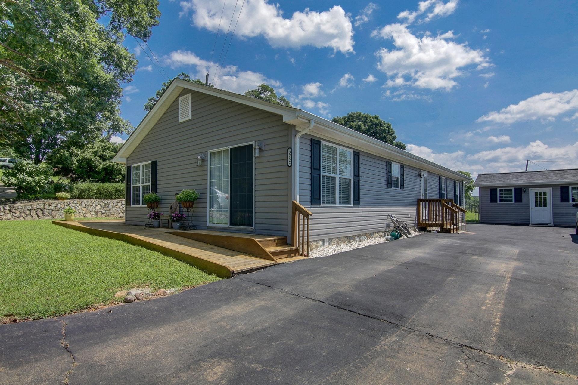 3762 Spradlin Road Goodview, VA 24095 - Photo 6 of 36 a view of a house with backyard and porch