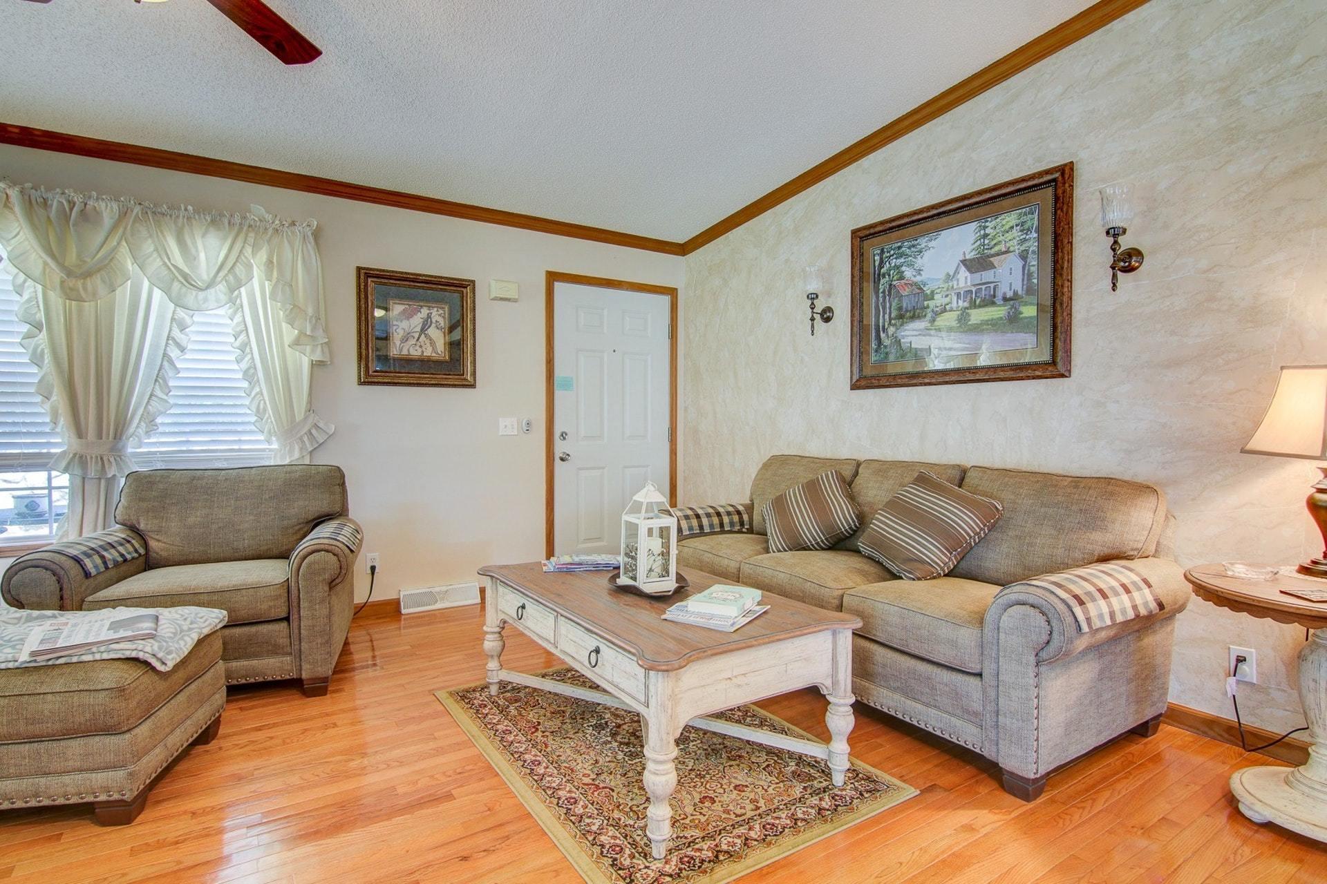 3762 Spradlin Road Goodview, VA 24095 - Photo 8 of 36 a living room with furniture and a large window