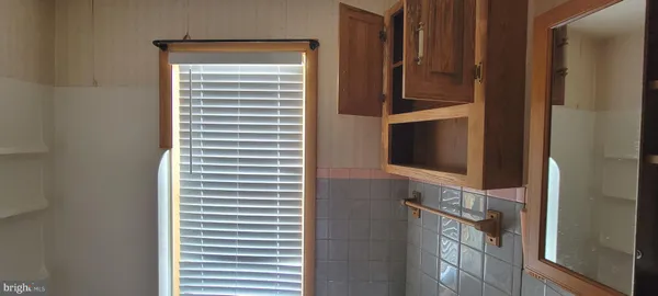 a bathroom with a toilet and a sink