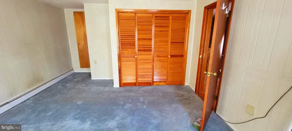 a view of front door with hallway