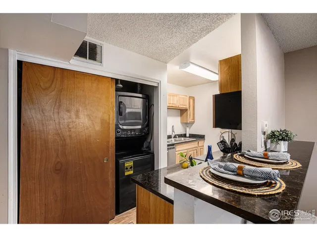 a room with furniture and a flat screen tv