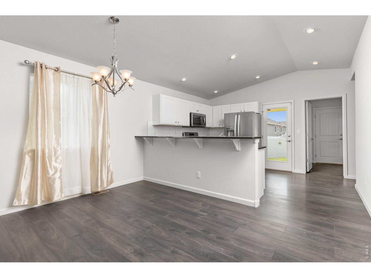 4231 Sunflower Road Evans, CO 80620 - Photo 20 of 29 Eating for large table and counter top/island type access for stools