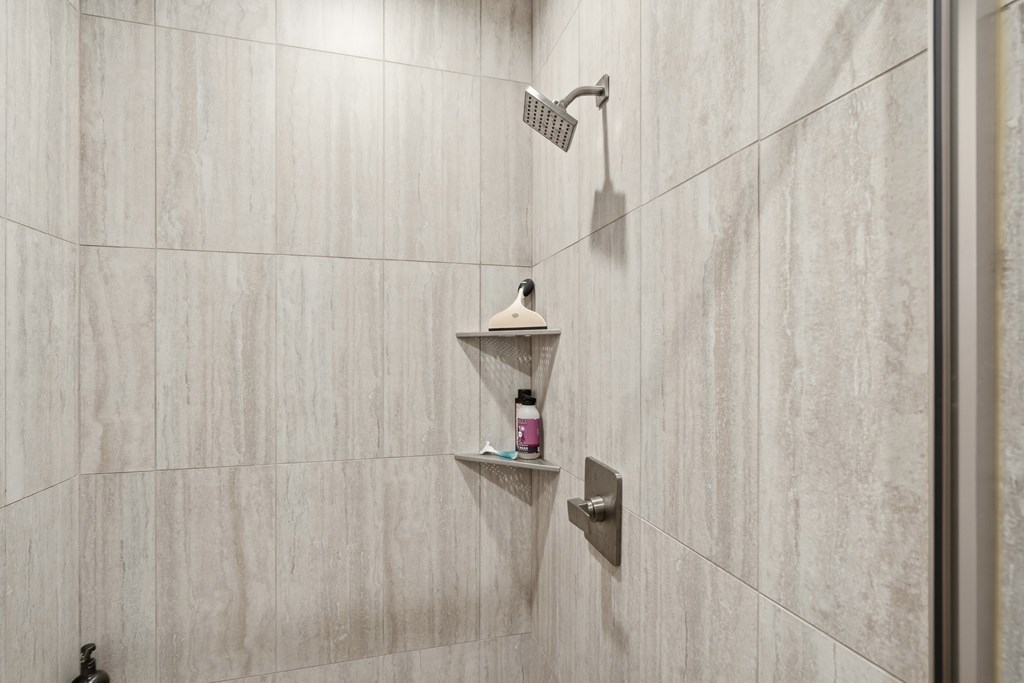 175 Crane Creek Road Young Harris, GA 30582 - Photo 24 of 40 a bathroom with a shower curtain