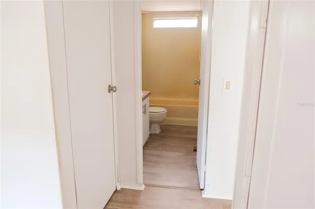 a view of outdoor space with trees all around