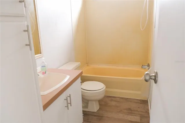 a view of backyard with green space