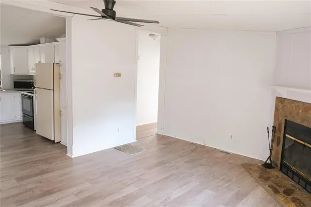 a view of a storage and utility room with washer and dryer