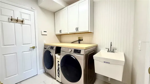 a utility room with dryer and washer