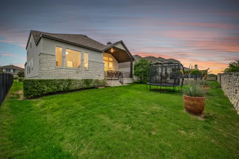 a house view with a garden space
