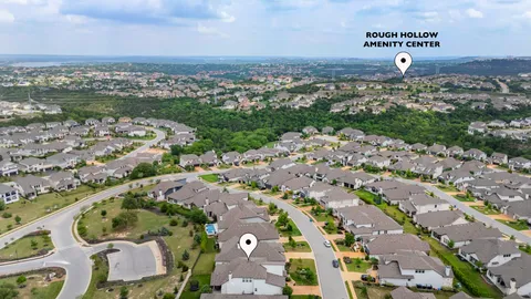 an aerial view of a city with lots of residential buildings